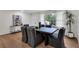 Modern dining room with a sleek table and hardwood floors at 2873 Bob Bettis Rd, Marietta, GA 30066