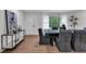 Modern dining room with a sleek table and hardwood floors at 2873 Bob Bettis Rd, Marietta, GA 30066