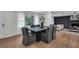 Bright dining room featuring a large wooden table and gray chairs at 2873 Bob Bettis Rd, Marietta, GA 30066