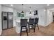 Modern white kitchen with stainless steel appliances and island at 2873 Bob Bettis Rd, Marietta, GA 30066