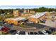 Aerial view of the rear exterior and parking lot of a large commerical building at 6945 Melody Dr, Buford, GA 30518