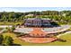 Aerial of a decorative brick courtyard near a building, with amphitheater and parking at 6945 Melody Dr, Buford, GA 30518