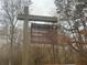 Bowmans Island sign for Chattahoochee River National Recreation Area surrounded by trees at 6945 Melody Dr, Buford, GA 30518