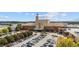 Aerial view of shopping center with ample parking at 6949 Melody Dr, Buford, GA 30518