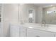 Modern bathroom with double vanity and walk-in shower at 6949 Melody Dr, Buford, GA 30518