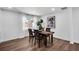 Elegant dining room featuring hardwood floors and stylish dining set at 1536 Daffodil Dr, Marietta, GA 30062