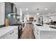 Modern kitchen with white cabinets, quartz countertops, and stainless steel appliances at 1536 Daffodil Dr, Marietta, GA 30062