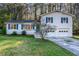 Charming two-story home with a well-maintained lawn and a two-car garage at 3090 Karen Ne Ln, Marietta, GA 30062