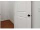 Walk-in closet with hardwood floors and white walls at 3875 Allegretto Cir # 116, Atlanta, GA 30339