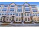 Three-story townhouses with brick facade and modern design at 3879 Allegretto Cir # 116, Atlanta, GA 30339