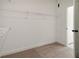 Spacious walk-in closet with wire shelving and carpet at 3875 Allegretto Cir # 116, Atlanta, GA 30339