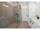 Modern bathroom featuring a glass-enclosed shower and single vanity at 3879 Allegretto Cir # 116, Atlanta, GA 30339