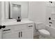 Well-lit bathroom featuring sleek white vanity, black hardware, and a shower-tub combo at 3879 Allegretto Cir # 116, Atlanta, GA 30339