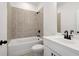 Well-designed bathroom featuring a tiled shower-tub combo and a modern vanity at 3879 Allegretto Cir # 116, Atlanta, GA 30339