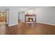 Inviting living room featuring a cozy fireplace, neutral walls, and attractive laminate flooring at 4195 Jeanette Ct, Norcross, GA 30093