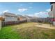 Fenced backyard with patio and grill, ready for outdoor entertaining at 5901 Seabright Ln, Atlanta, GA 30349