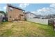 Large backyard with patio, grill and privacy fence at 5901 Seabright Ln, Atlanta, GA 30349