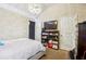 Bright bedroom with a large bed and shoe storage at 5901 Seabright Ln, Atlanta, GA 30349