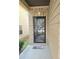 Modern black front door with glass panels and a welcome mat at 5901 Seabright Ln, Atlanta, GA 30349