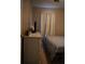 Bedroom featuring a white dresser and a small television near a bed and window at 4120 Highway 92, Acworth, GA 30102
