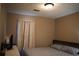 Bedroom featuring neutral-toned walls, a window with curtains, and a cozy bed at 4120 Highway 92, Acworth, GA 30102