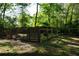Fenced in area in the backyard featuring trees and partial shade at 4120 Highway 92, Acworth, GA 30102