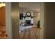 Open living room view highlighting the fireplace, floors and neutral walls at 4120 Highway 92, Acworth, GA 30102