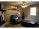 Bright living room featuring a decorative fireplace, hardwood floors and earth tone walls at 4120 Highway 92, Acworth, GA 30102