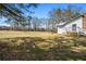 View of back of the home with the large backyard at 5333 Pine Valley Rd, Powder Springs, GA 30127