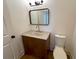 Bathroom featuring modern fixtures, mirror, and vanity at 10340 Meadow Crest Ln, Alpharetta, GA 30022