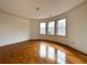 Bedroom with hardwood floors and large windows at 10340 Meadow Crest Ln, Alpharetta, GA 30022