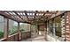 An exterior deck offers a pergola, wood railings, and a partial lattice wall at 10340 Meadow Crest Ln, Alpharetta, GA 30022