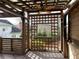 A lovely deck has a lattice screen, wooden railings, and a ceiling fan at 10340 Meadow Crest Ln, Alpharetta, GA 30022