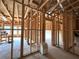 Interior view of new home construction showing wooden framing at 10340 Meadow Crest Ln, Alpharetta, GA 30022