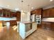 Kitchen island with stainless steel appliances and custom cabinetry at 10340 Meadow Crest Ln, Alpharetta, GA 30022