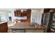 Kitchen featuring granite countertops, stainless steel appliances, and custom cabinets at 10340 Meadow Crest Ln, Alpharetta, GA 30022