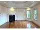 Living room featuring a fireplace, recessed lighting, and hardwood flooring at 10340 Meadow Crest Ln, Alpharetta, GA 30022