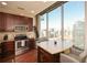 Modern kitchen with stainless steel appliances and granite countertops at 855 Peachtree Ne St # 2412, Atlanta, GA 30308