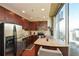Kitchen features stainless steel appliances and wood cabinets at 855 Peachtree Ne St # 2412, Atlanta, GA 30308