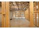 Unfinished basement with framed walls and concrete floor at 325 Mont Harmony Sw Rd, Powder Springs, GA 30127