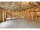 Unfinished basement with framed walls and open space at 325 Mont Harmony Sw Rd, Powder Springs, GA 30127