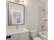 Bathroom with a vanity, toilet, shower, and bathtub at 325 Mont Harmony Sw Rd, Powder Springs, GA 30127