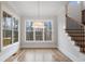 Bright breakfast nook with hardwood floors and ample natural light at 325 Mont Harmony Sw Rd, Powder Springs, GA 30127