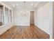 Formal dining room with hardwood floors and chandelier at 325 Mont Harmony Sw Rd, Powder Springs, GA 30127