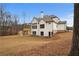 Rear view of house highlighting its design and deck at 325 Mont Harmony Sw Rd, Powder Springs, GA 30127