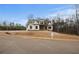 A charming two-story home situated on a tree-lined lot at 325 Mont Harmony Sw Rd, Powder Springs, GA 30127