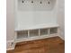 Built-in mudroom bench with cubbies and hooks at 325 Mont Harmony Sw Rd, Powder Springs, GA 30127