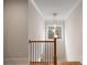 Upstairs hallway featuring a light and bright aesthetic at 325 Mont Harmony Sw Rd, Powder Springs, GA 30127