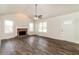 Bright living room with hardwood floors, fireplace and ample natural light at 29 Autumn Ne Pl, White, GA 30184