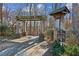 A beautiful pergola and sign mark the entrance to the Marina and Nature Trail at 5705 Windjammer Pt, Cumming, GA 30041